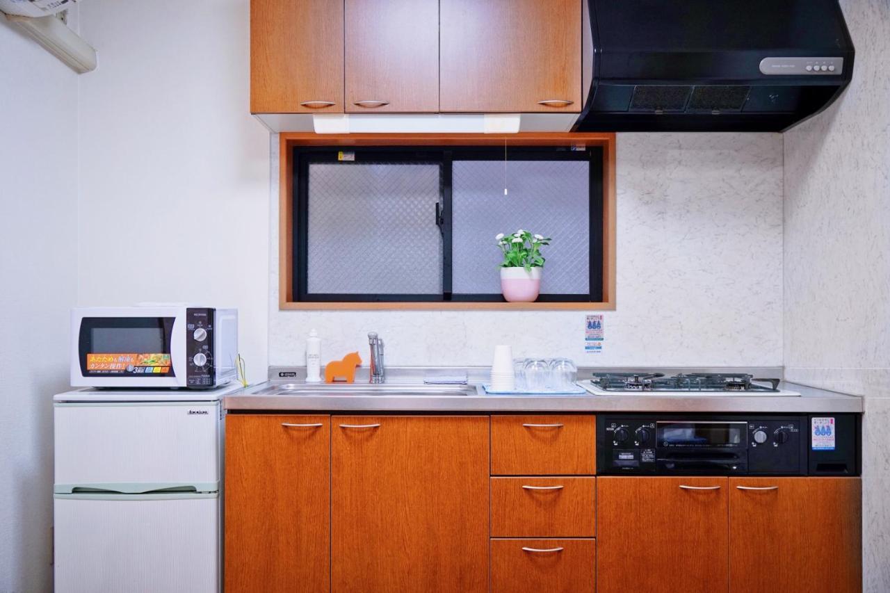 Tg House Apartment Osaka Bagian luar foto