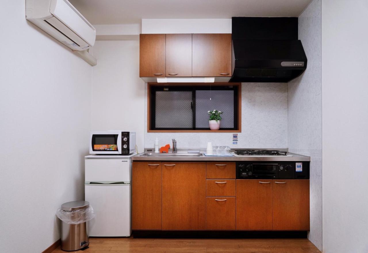 Tg House Apartment Osaka Bagian luar foto